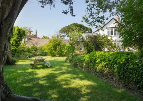 The garden & outdoor sitting area at Coombe Rise, Poughill