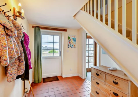 The entrance hallway & stairs up to the first floor at Coombe View at Spirewell Farm, Wembury