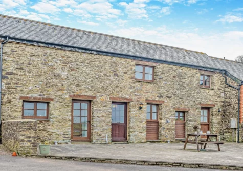 The patio & alfresco dining area at Coombe View at Spirewell Farm, Wembury