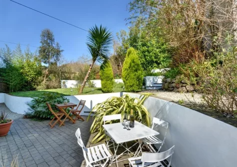 The patio, alfresco dining area & garden at Corner Cottage, Trevarren