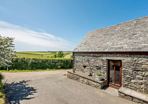 Countryside View, a cosy barn conversion, is surrounded by lush patchwork countryside in an enviable hilltop location