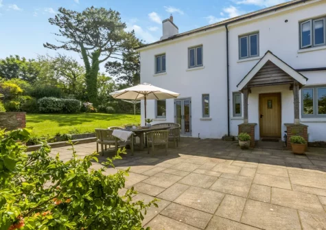 The patio, barbecue & alfresco dining area at Court Barton Farm, South Huish