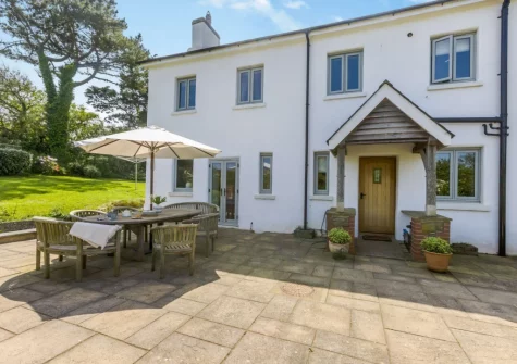 The patio, barbecue & alfresco dining area at Court Barton Farm, South Huish
