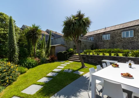 The patio, alfresco dining area & enclosed garden at Court House, Padstow