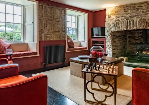 Court House, Padstow is an exceptional Grade II-listed 5-bedroom retreat in the heart of this celebrated port. Enjoy period features, luxurious interiors, a private garden with estuary views, and access to Cornwall's finest beaches and attractions.