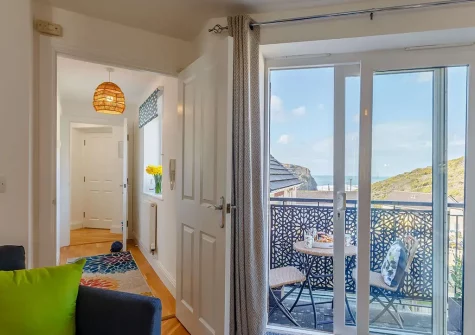 The balcony & outdoor sitting area at Cove View, Porthtowan