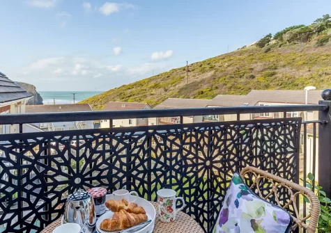 The balcony & outdoor sitting area at Cove View, Porthtowan
