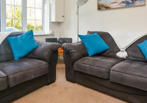 Coverack Cottage, St Keverne is a welcoming single-storey retreat on the Lizard Peninsula, featuring a peaceful enclosed garden, bright open-plan living spaces, and easy access to dramatic coastal paths, hidden coves, and Cornwall's unspoilt beauty.
