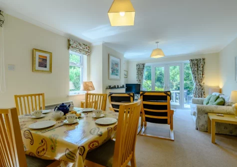 The living / dining area at Cowries, Constantine Bay
