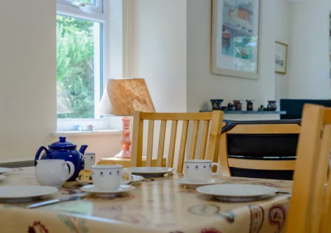 The living / dining area at Cowries, Constantine Bay