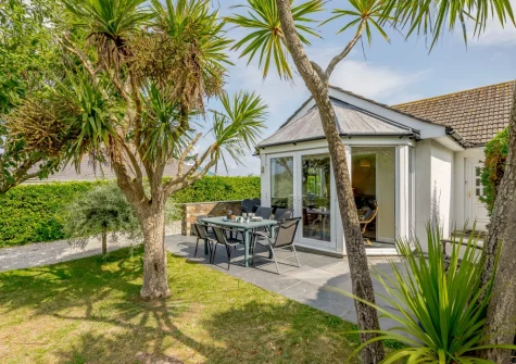 The patio, barbecue, alfresco dining area & lawned garden at Cowries, Constantine Bay