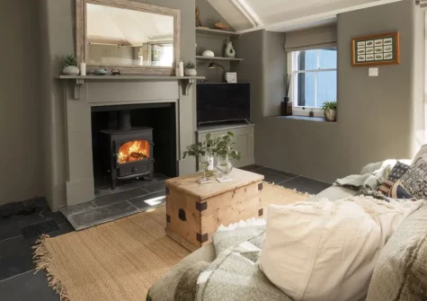 Crab Cottage, Mousehole is a beautifully renovated pet-friendly retreat, with gorgeous furnishings and a stunning tiered garden. Enjoy sea views, together with modern comforts, and easy access to Cornwall's most magical harbour village.