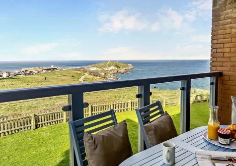 The balcony & alfresco dining area at Cribber Point, Newquay