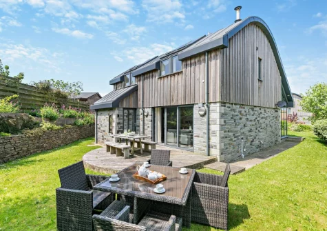 The decked patio, alfresco dining area & garden at Crigmorrick, Trevone