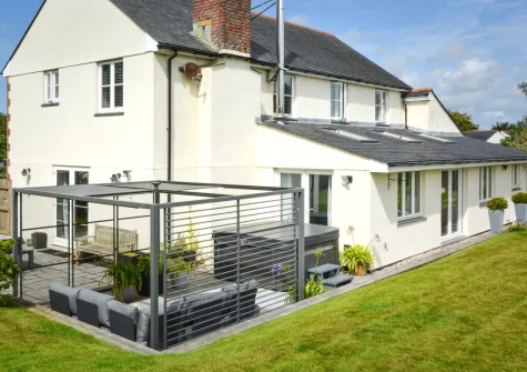 The patio, hot tub, outdoor sitting area & garden at Croft House, Mitchell