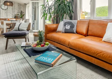 Croft House, Mitchell is a luxurious five-bedroom family home nestled in Cornwall's countryside, featuring a hot tub, enclosed garden, and easy access to Newquay's beaches and attractions. Perfect for creating cherished family memories.