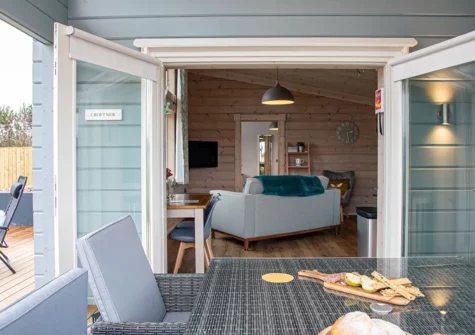 The decked patio & alfresco dining area at Croftner, Great Field Lodges, Braunton