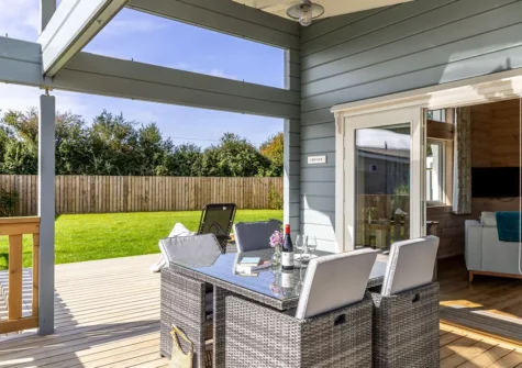 The decked patio & alfresco dining area at Croftner, Great Field Lodges, Braunton