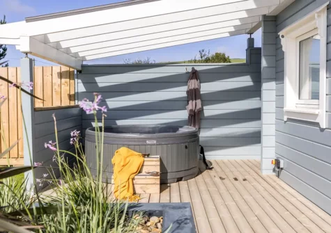 The decked patio & hot tub at Croftner, Great Field Lodges, Braunton