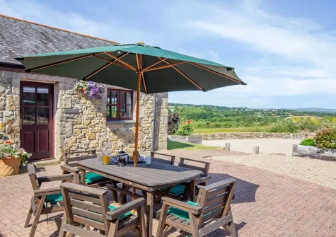 The patio & alfresco dining area at Crofty, Germoe
