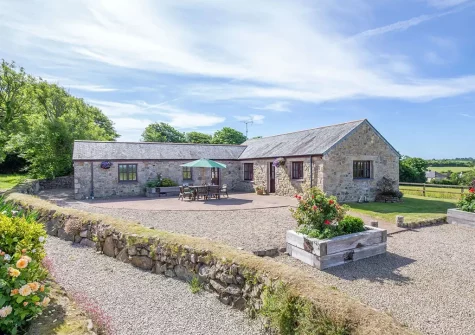 Crofty is a lovingly converted barn in idyllic rural setting with a patio garden - part of a complex of 4 all with original features throughout