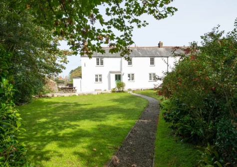 The lawned garden at Cross House, St Issey