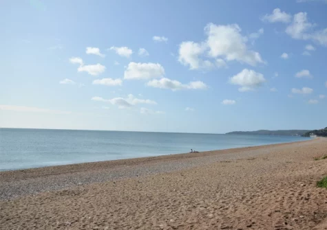 Torcross Beach is a breathtaking stretch of coastline where golden beaches meet rich history & stunning natural beauty