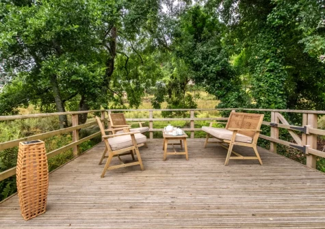 The decked patio & outdoor sitting area at Dairy Cottage, Swimbridge
