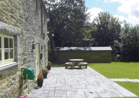 The patio, alfresco dining area & enclosed garden at Daisy's Cottage, Fentonadle