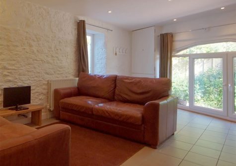 The living area at Dandelion Cottage, Blagdon House Country Cottages, Blagdon