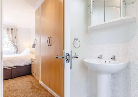 Bedroom #1 & en-suite shower room at Dartmoor Lodge, Meldon Lodge Park, Meldon
