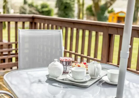 The decked patio & alfresco dining area at Dartmoor Lodge, Meldon Lodge Park, Meldon