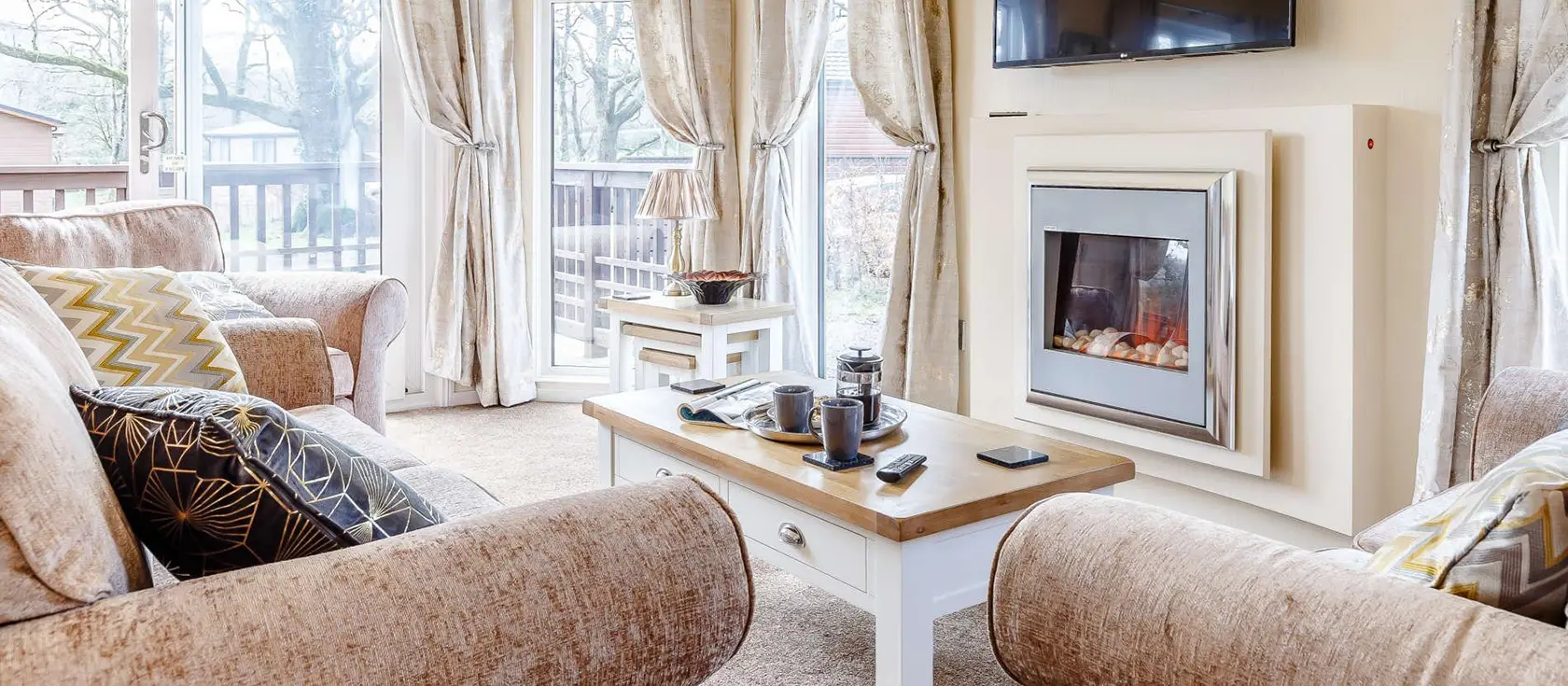 Dartmoor Lodge, Meldon Lodge Park, Meldon is a stylish three-bedroom retreat with private hot tub and enclosed decking. This modern lodge offers luxurious comfort on the doorstep of Dartmoor National Park, perfect for memorable family holidays.