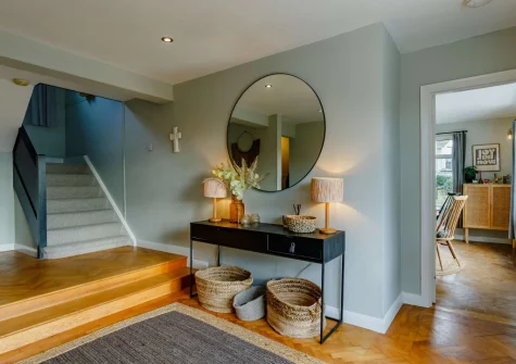 The entrance hallway & stairs up to the first floor at Dene Court, Trenance