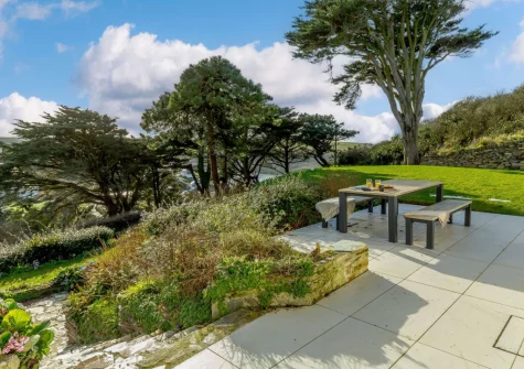 The terrace, alfresco dining area & lawned garden at Dene Court, Trenance