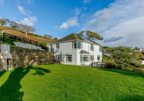 The terrace, outdoor shower, barbecue & lawned garden at Dene Court, Trenance