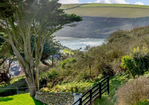 The lawnedgarden & views towards the bay at Dene Court, Trenance
