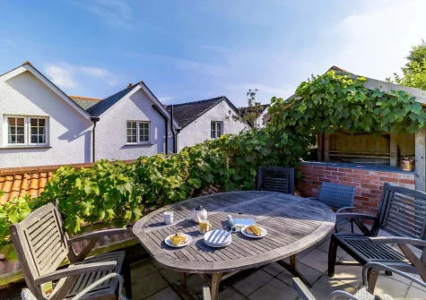 The patio & alfresco dining area at Devereux's, Littleham