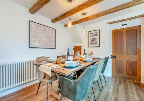 The dining area at Deviock Farm House, Downderry