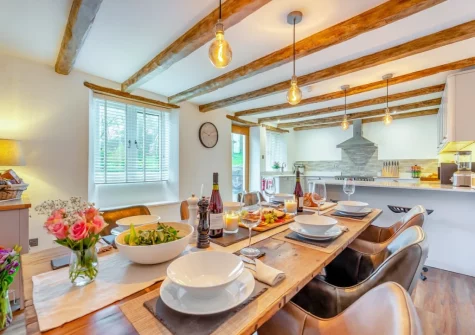 The dining area at Deviock Farm House, Downderry