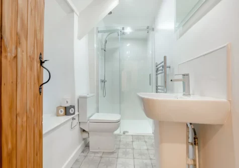 The shower room at Deviock Farm House, Downderry