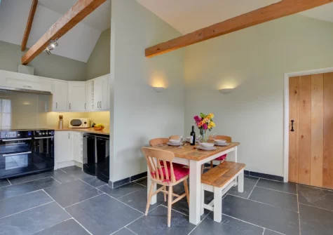 The kitchen & dining area at Dickins' Cottage, Trenarlett Farm, St Breward