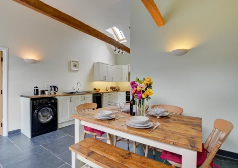 The kitchen & dining area at Dickins' Cottage, Trenarlett Farm, St Breward