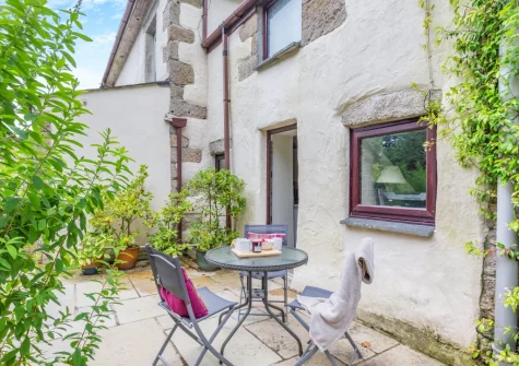 The patio, barbecue & outdoor sitting area at Dingley Cottage, Porkellis
