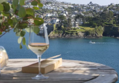 Enjoy fantastic far-reaching river views from the outdoor sitting area at Dolly's Plaice, Fowey