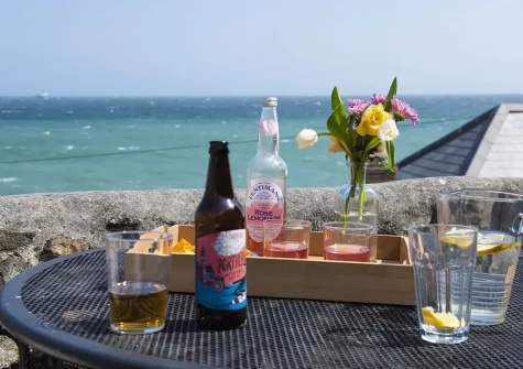 Enjoy far-reaching sea views from the outdoor sitting area at Dolor Cottage, Coverack