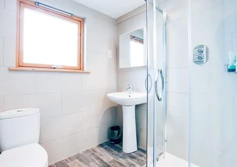 The shower room at  at Dolphins, Coverack
