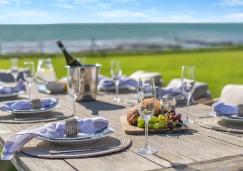 The lawned garden & alfresco dining area at Dolphins, Downderry