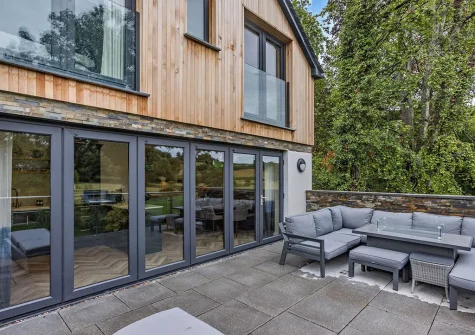 The patio & alfresco dining area at Dowr Gwel, Stratton