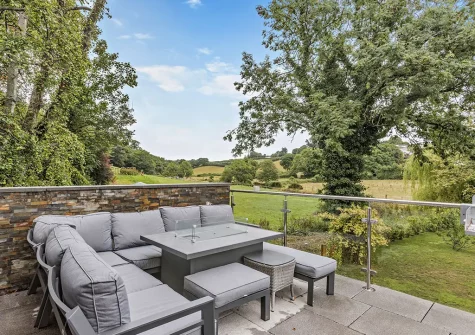 The patio & alfresco dining area at Dowr Gwel, Stratton